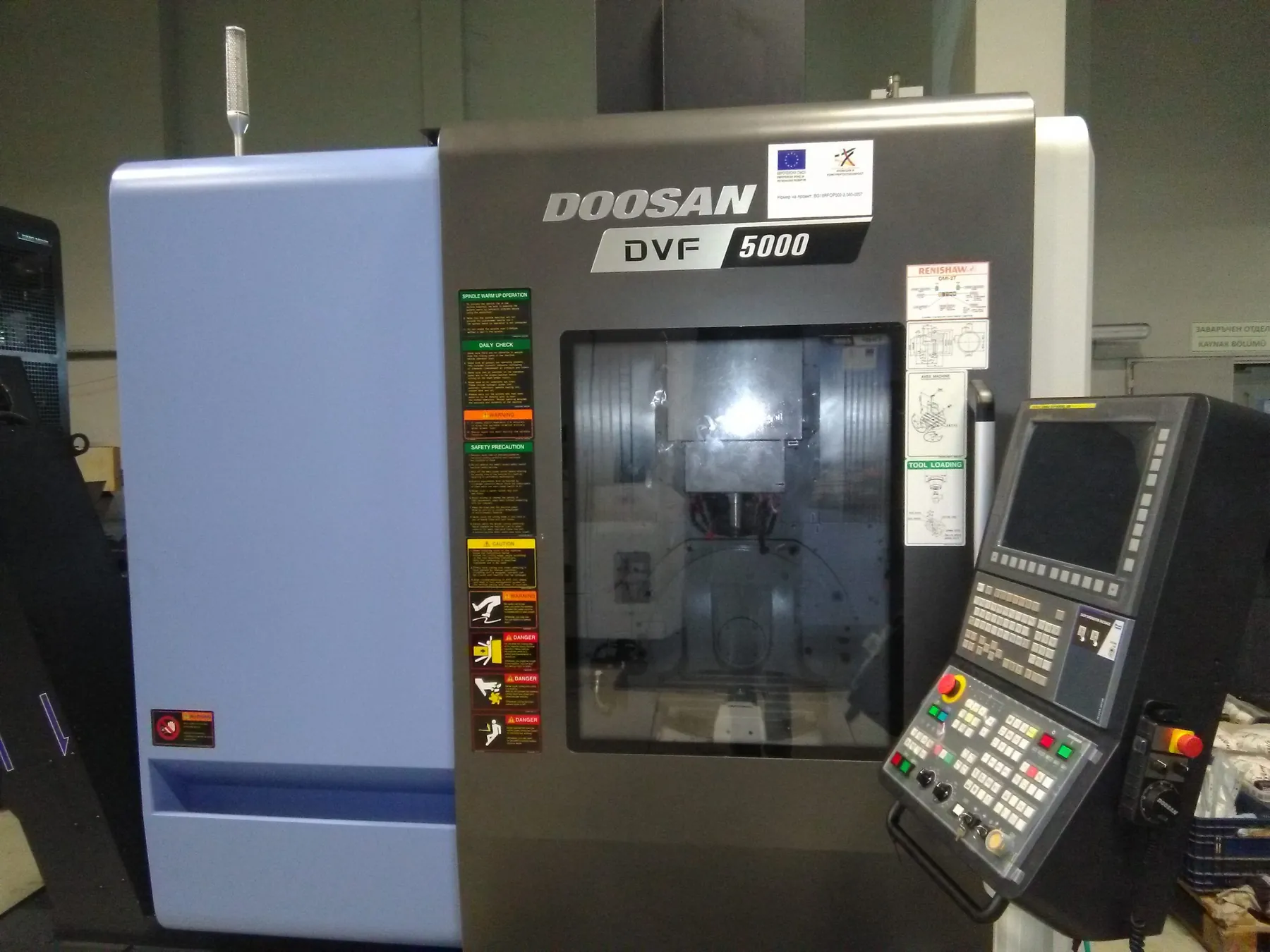 product photo — снимка на доставените машини (Doosan) в производствената база